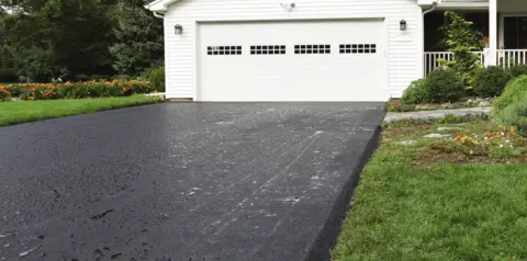 A freshly painted concrete driveway